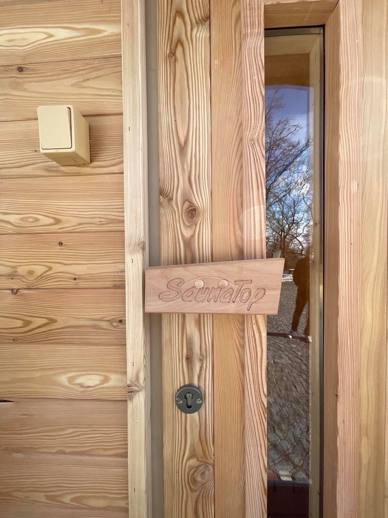 Dveře logo sauny